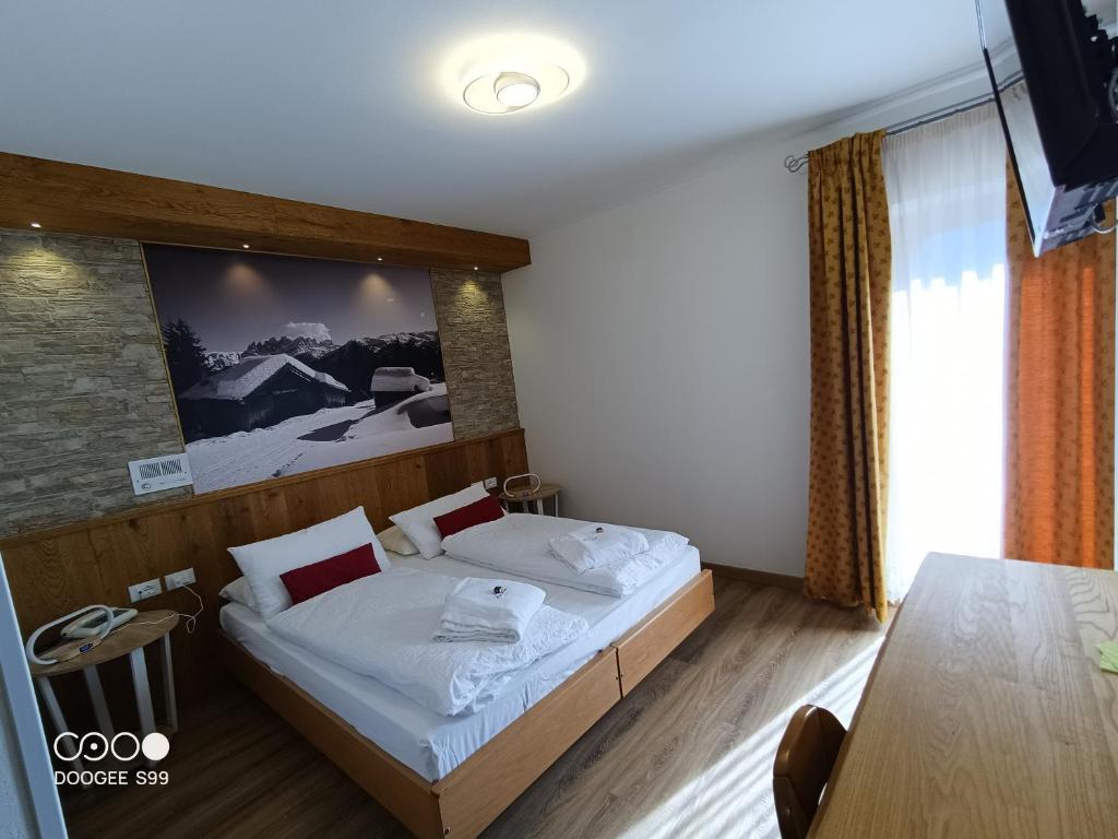 5denní zájezd (denní přejezd) s dopravou, polopenzí a skipasem v ceně – hotel Arnica
