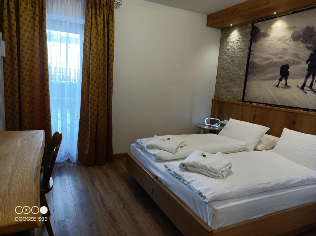 5denní zájezd (denní přejezd) s dopravou, polopenzí a skipasem v ceně – hotel Arnica