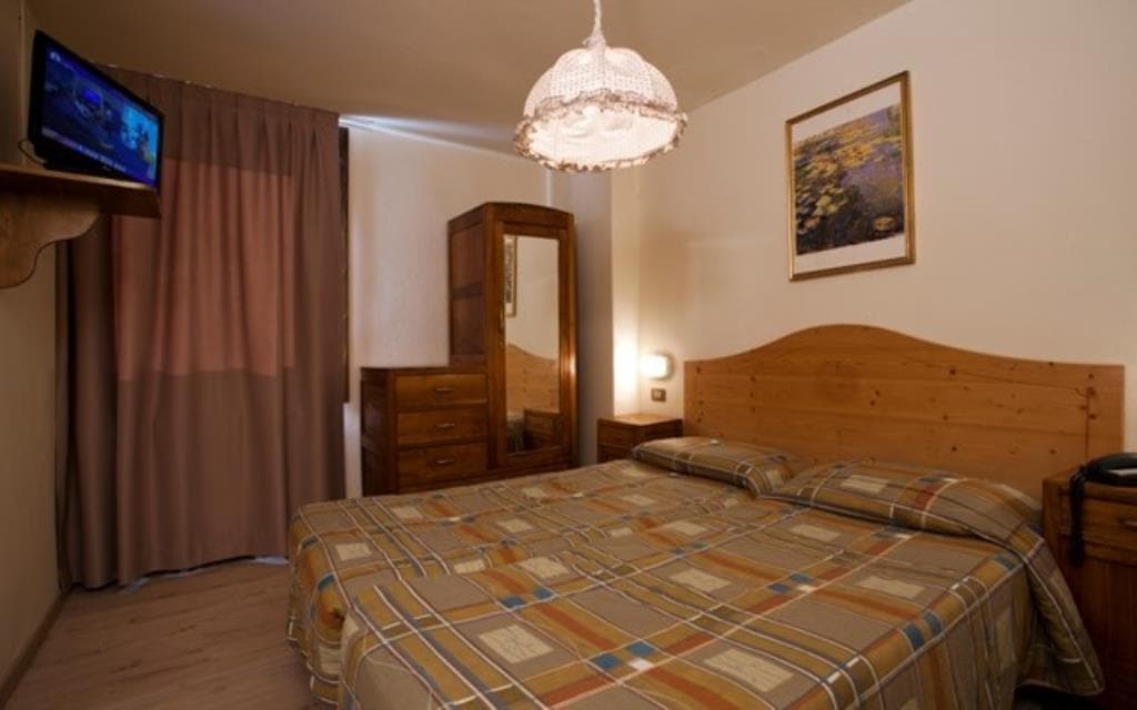 5denní zájezd (denní přejezd) s dopravou, polopenzí a skipasem v ceně – chalet Alpino