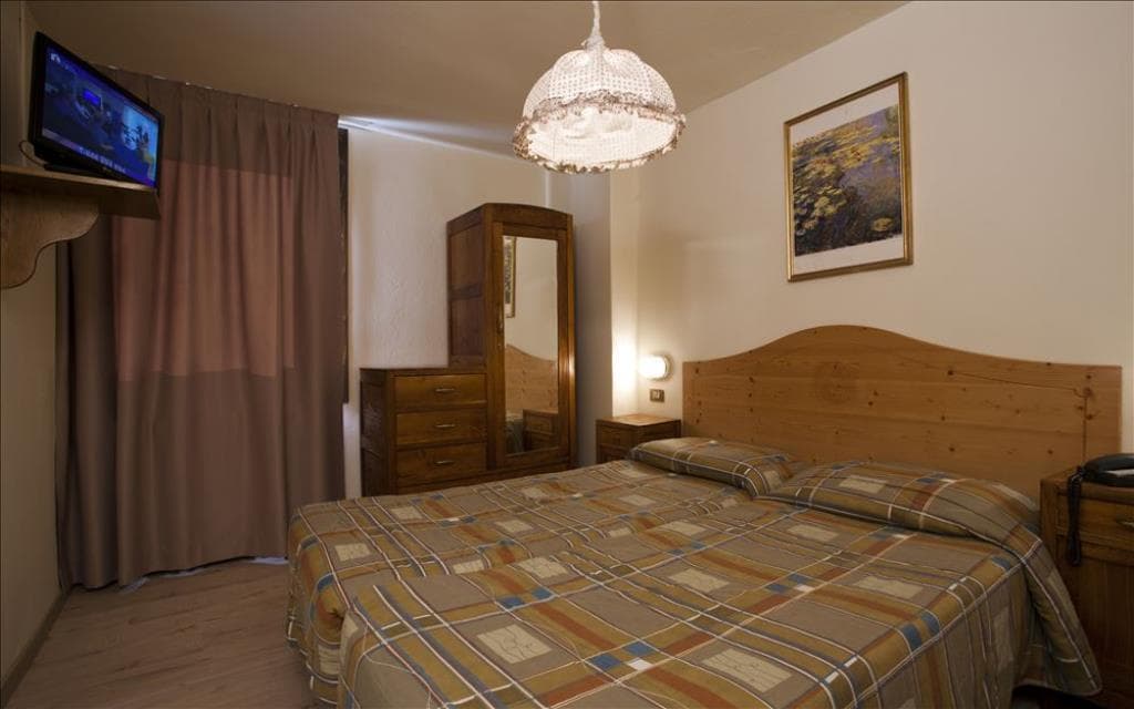 5denní zájezd (denní přejezd) s dopravou, polopenzí a skipasem v ceně – chalet Alpino
